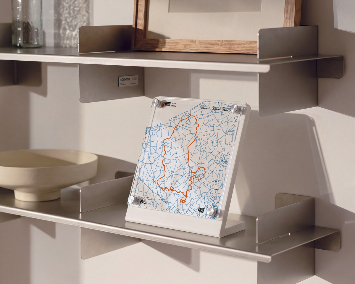 Personalized Cycle Flanders Fields 180K cycling achievement display with custom route and ride details in a modern interior