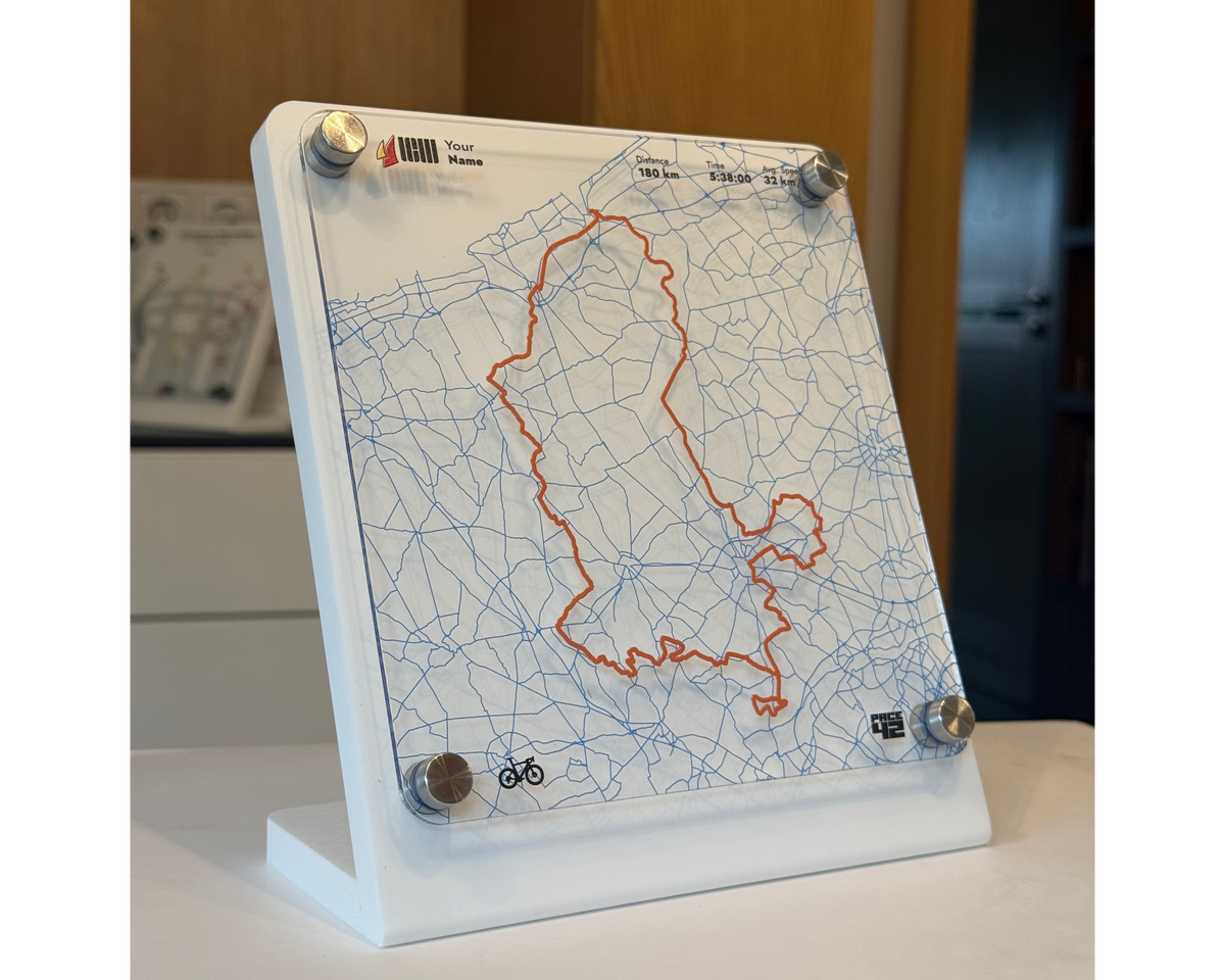 Angled view of the custom Cycle Flanders Fields 180K cycling achievement display with route, average speed and finishing time
